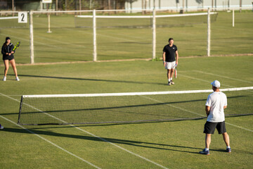 Amateur Tennis player, playing tennis at a tournament and match on grass in Europe 
