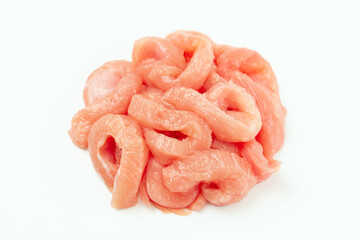 Fresh frozen pieces of turkey meat on a white background.Raw chicken.Frozen chicken fillet..Ogranic food and healthy eating.frozen turkey or poultry meat.