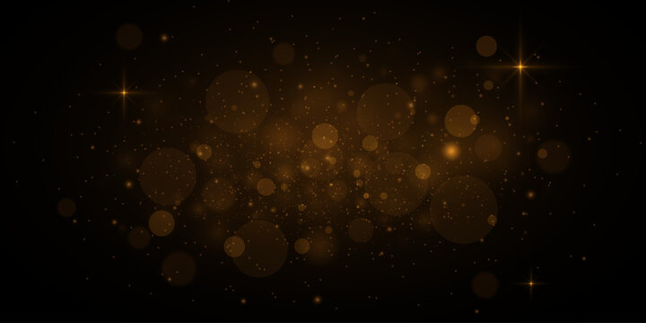Glowing golden bokeh circles, sparkling gold dust. Abstract gold luxury light decoration.
