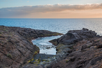View to Atlantic ocean and rocks in Playa Paraiso, Adeje, Tenerife, Canary Islands, Spain.
