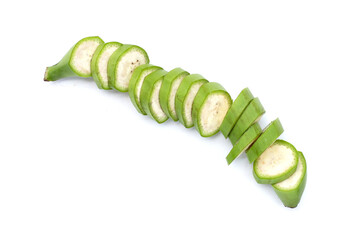 Raw banana slices on white background.