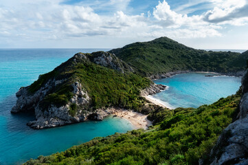 Porto Timoni - amazing beautiful double beach in Corfu, Greece. Porto Timoni beach at Afionas looks like paradise (crystal clear azure, turquoise water in Corfu, Ionian island - Europe)