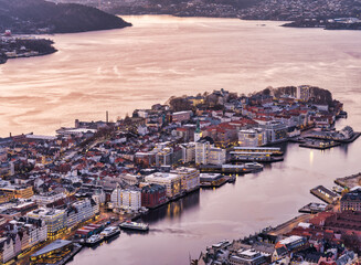 Long exposure aerial shot of Bergen harbour, lit up after sunset, Norway