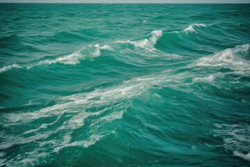 Fototapeta premium stormy ocean with waves crashing against rocks. Generative AI