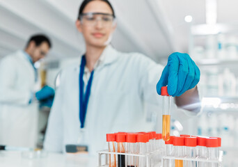 Undertaking a new controlled trial. Closeup shot of an unrecognisable scientist working with...