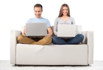 Smiling Couple Using Laptop on the Couch