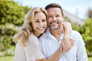 Hes and amazing husband. Shot of an affectionate couple spending time outdoors.