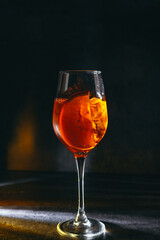 cocktail on a dark background with ice and fruits. menu format
