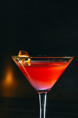 cocktail on a dark background with ice and fruits. menu format
