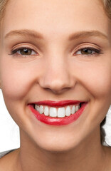 Portrait of a Woman Smiling with Red Lipstick