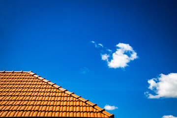 new red tiles roof and blue sky
