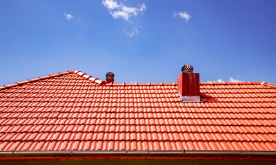 new red tiles roof and blue sky
