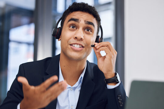 I can explain further if youd like. Shot of a young call centre agent working in an office.