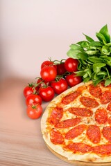 Tasty fresh pizza with salami, Italian food