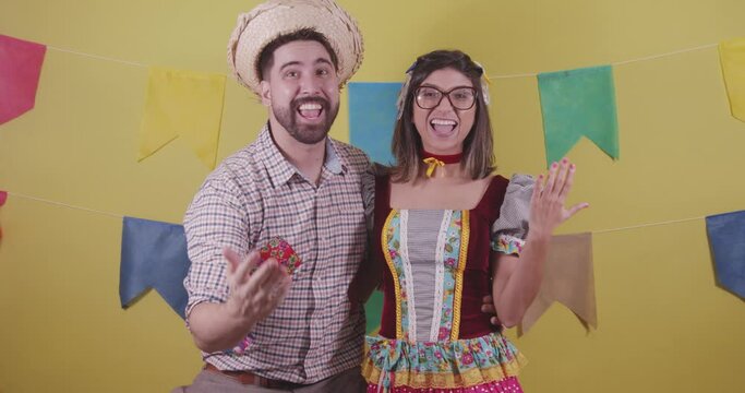 Brazilian couple, dressed in Junina party clothes, S&atilde;o Jo&atilde;o party. Protocol scenes.