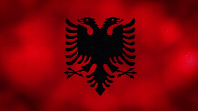 Waving Flag of Albania video background with vintage vignette overlay effect. Realistic Slow Motion