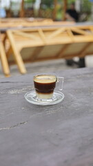 Fototapeta na wymiar hot espresso coffee in a cup