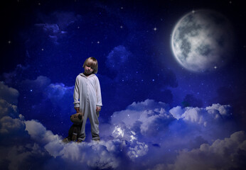 Boy holding toy and sleepwalking on clouds in starry sky with full moon