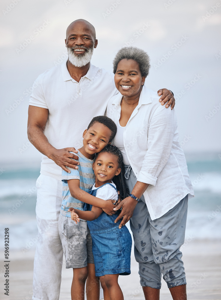 Sticker Our loving legacy. Shot of a mature couple bonding with their grandkids at the beach.