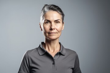 Fototapeta premium Portrait of a middle-aged woman in a gray T-shirt