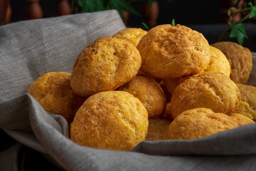 French cheese puffs made from savory choux pastry with cheddar and parmesan cheese, then baked until golden brown.