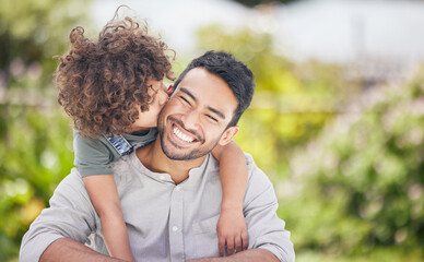 Fototapeta premium I feel totally loved. Shot of a little boy giving his father a kiss on the cheek outdoors.