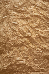 crumpled thin brown paper, brownish tone wrinkled recycle sheet of paper surface background texture, graphic resources with space for text