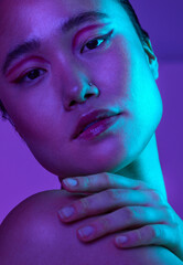 Ima kick it off. Cropped shot of an attractive young woman posing in studio against a purple background.