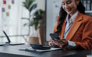 Obraz premium Profile of the firm's accountant for company registration, bookkeeping, asian people working with Deferred Incomes, Drawing Account, stock market, Depletion, Doubtful Debt, Equivalent Units