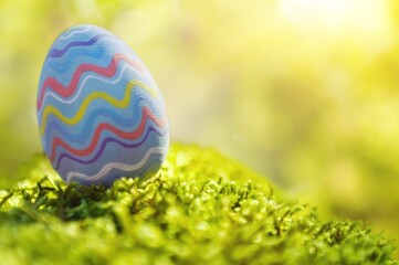 Easter colored eggs on outdoor background