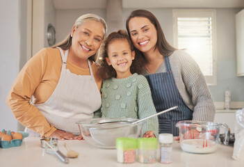 When you crave something sweet, well whisk it up. Shot of a little girl baking with her mother and...