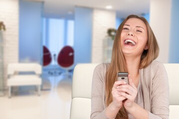 Free time. Young girl checking networks on phone