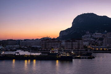 The rock of Gibraltar shot at sunrise from open deck of cruise liner