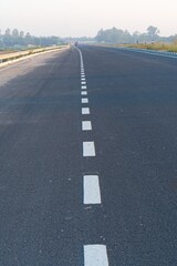 Fototapeta premium white marking made on the national highway in India