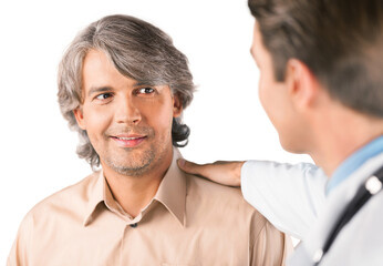 Portrait of a Mature Man Talking with a Doctor