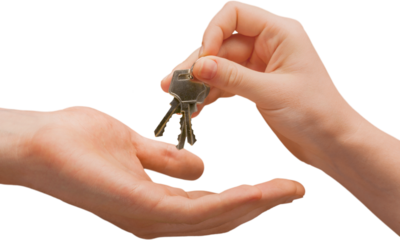 Metal house keys in human hands