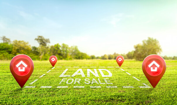 Land plot management - real estate concept with a vacant land on a green field available for building construction and housing subdivision in a residential area for sale, rent, buy or investment.