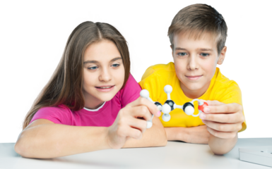 Two School Children Holding Molecular Model