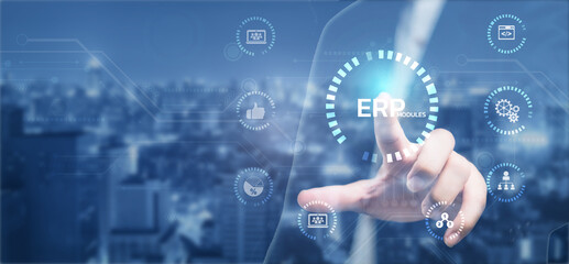 Businessman touching on virtual screen ERP - Enterprise resource planning and technology concept.