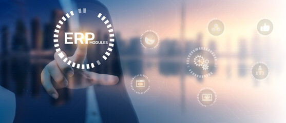 Businessman touching on virtual screen ERP - Enterprise resource planning and technology concept.