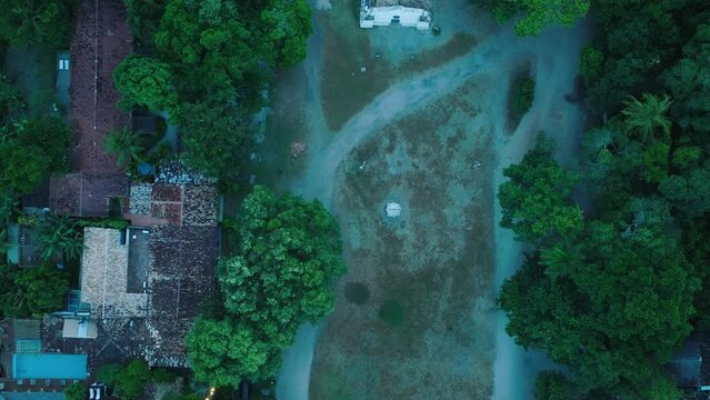 Aerial Top-Down Drone View of beach town Trancoso in Bahia Brazil with rooftops and Quadrado