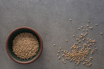 Lentils in a green clay bowl
