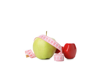 Concept of weight loss with apple and measuring tape, isolated on white background