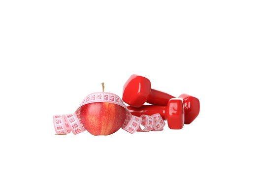 Concept of weight loss with apple and measuring tape, isolated on white background