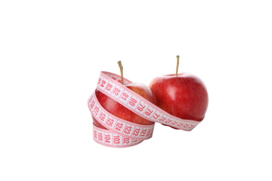 Concept of weight loss with apple and measuring tape, isolated on white background