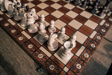 chess pieces on a chessboard © Sidney vd Boogaard