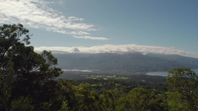 Rising Aerial Drone Footage of Tahiti Island from Mountain Top Establishing Shot of Tahiti Iti