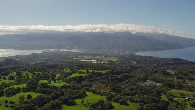 Slow Rising Aerial Drone Footage of Tahiti and Tahiti Iti Islands from Dense Jungle Mountain Top