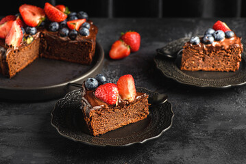 chocolate cake decorated with berries