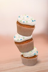 Sugar sprinkles on tasty sweet cupcakes